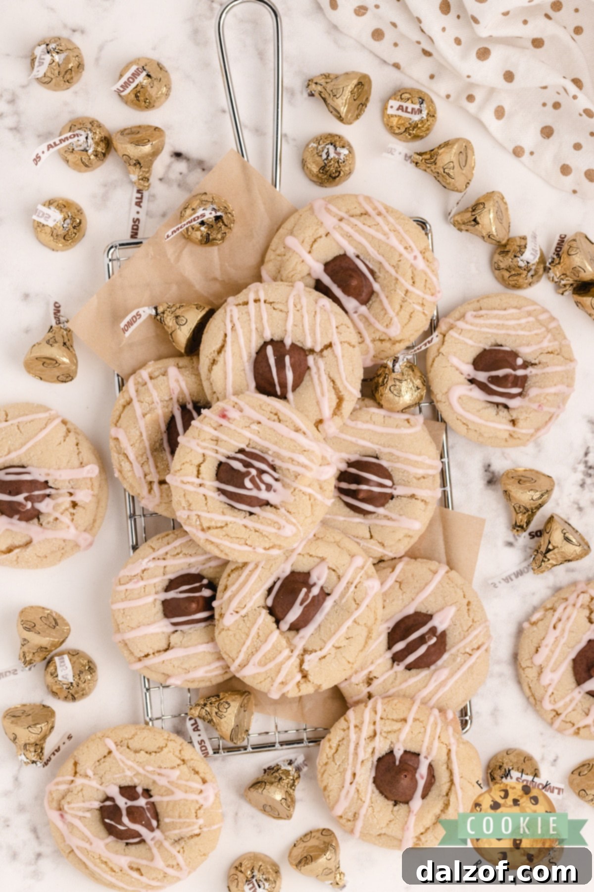 Almond cookies with almond kisses in the middle