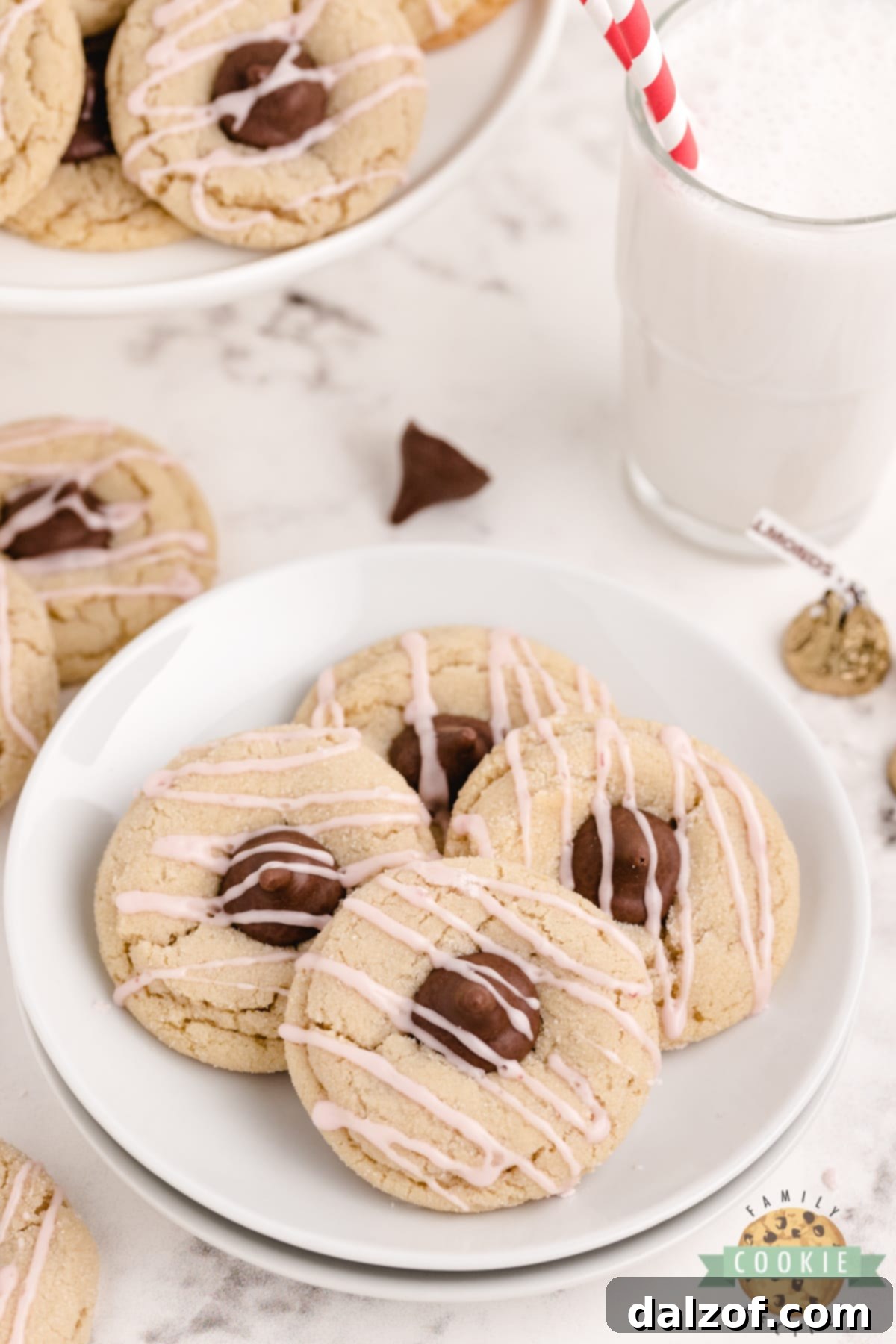 Simple almond cookies with a chocolate almond kiss in the middle
