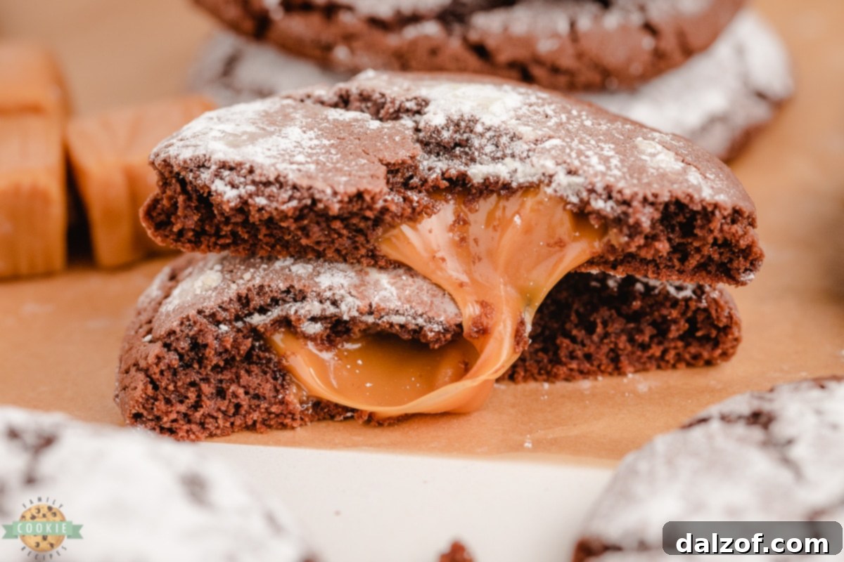 Decadent Caramel Chocolate Crinkle Cookies dusted with powdered sugar