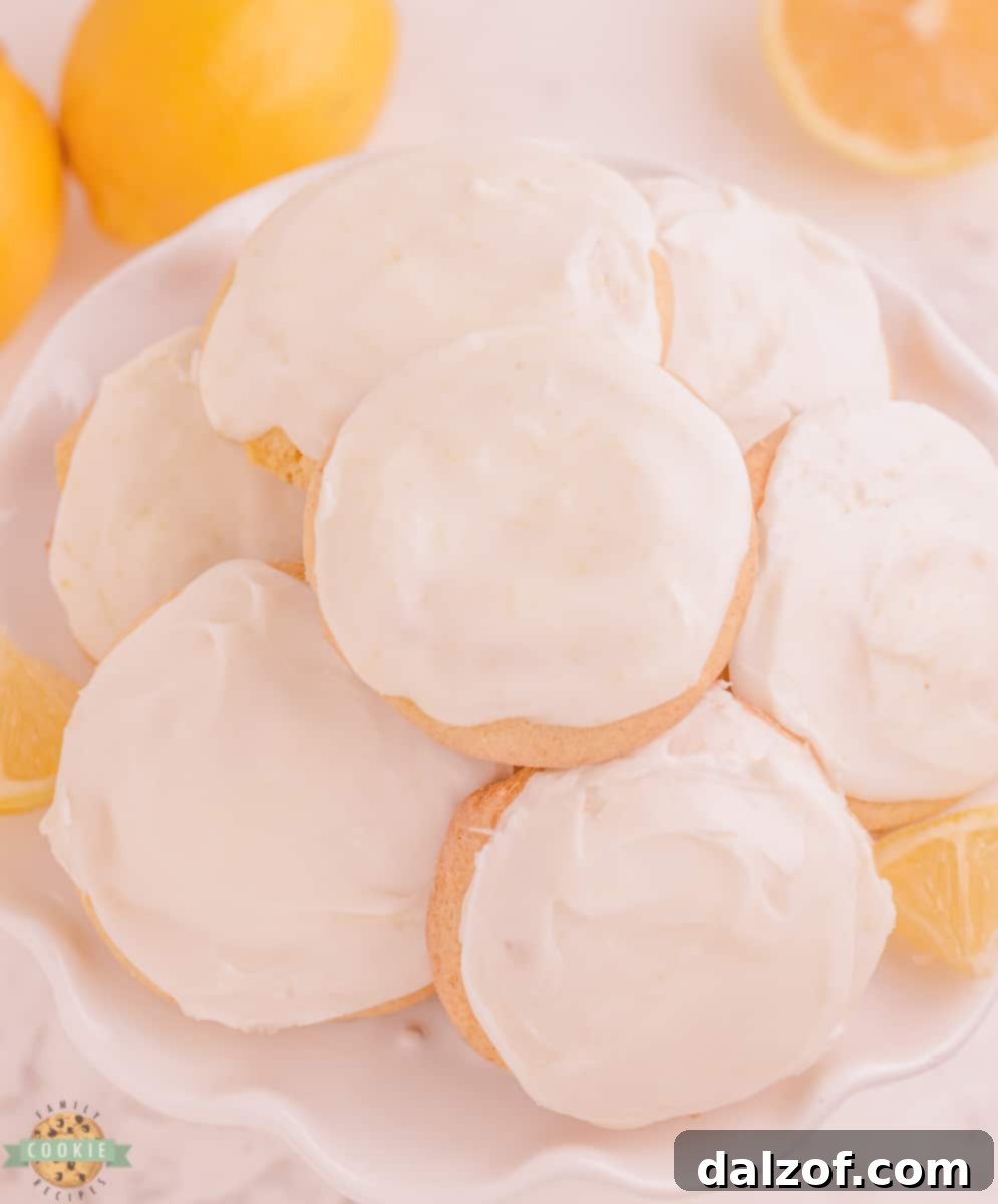 lemon cake mix Cool Whip cookies with a vanilla glaze