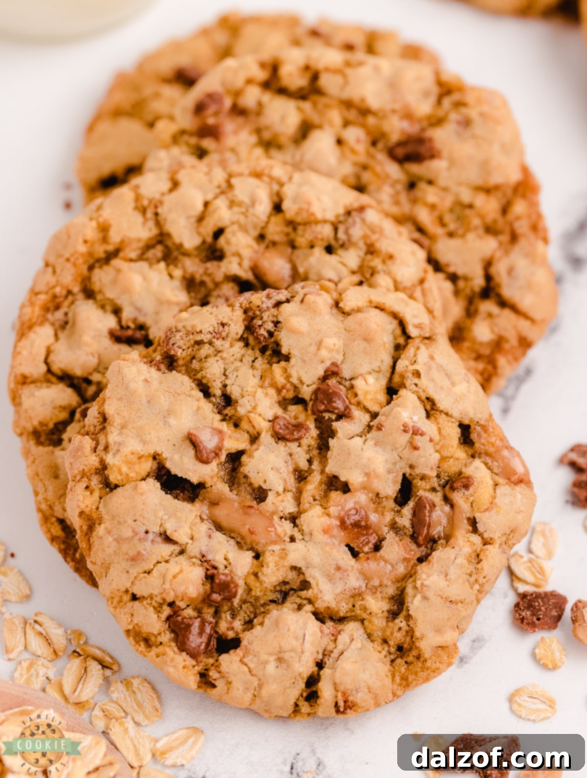 batch of oatmeal toffee cookies on a cooling rack