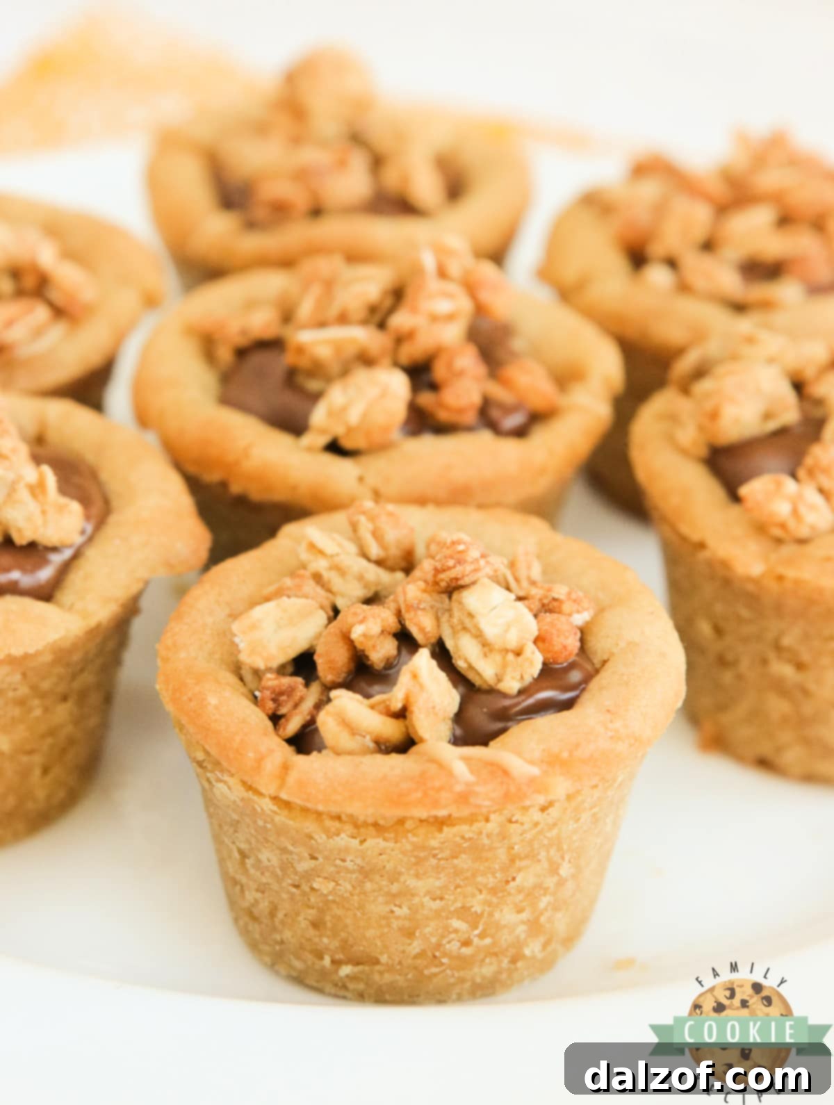 Delightful Chocolate Peanut Butter Cookie Cups with granola topping