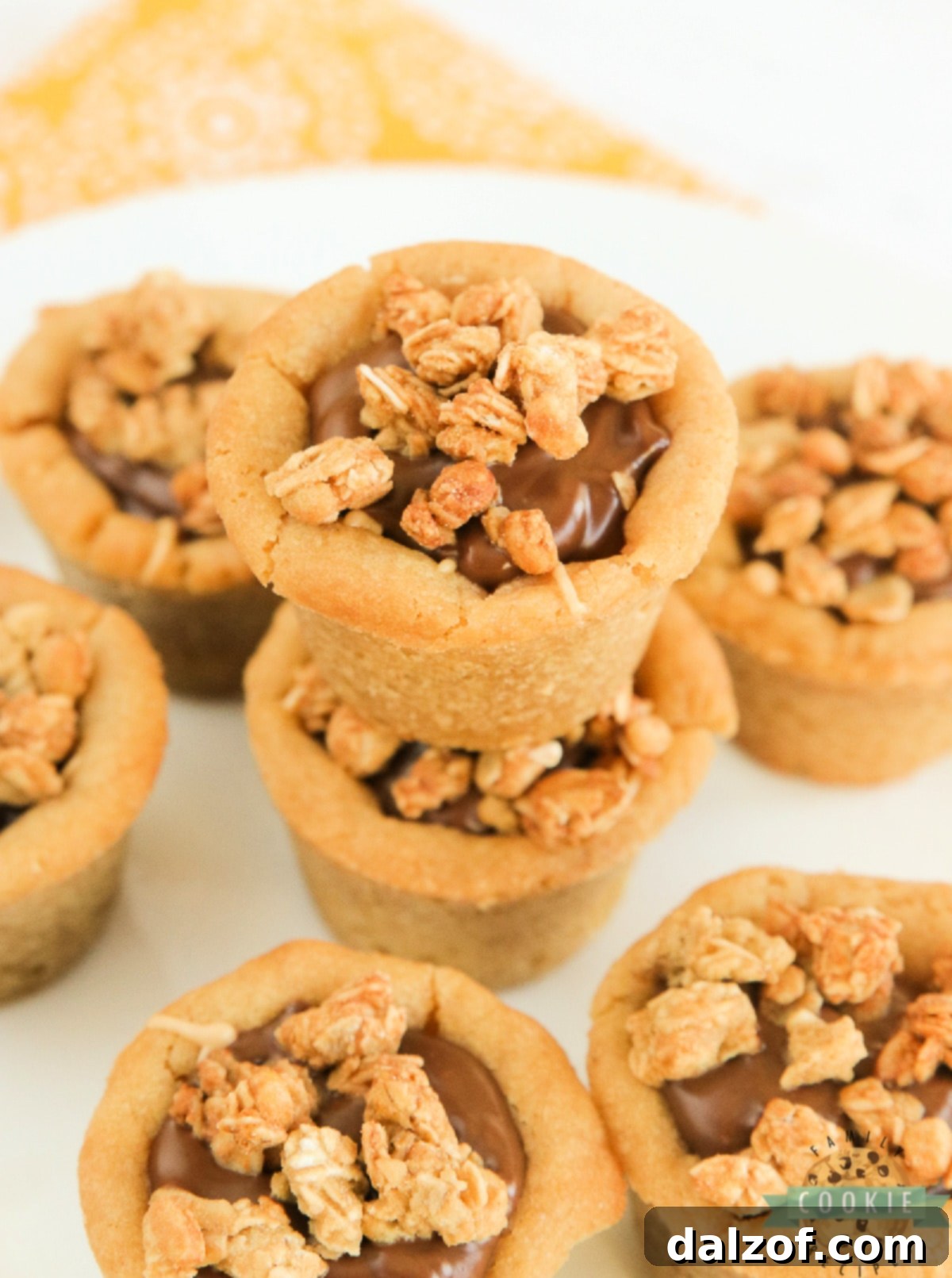 Delicious Chocolate Peanut Butter Cookie Cups in a mini muffin pan