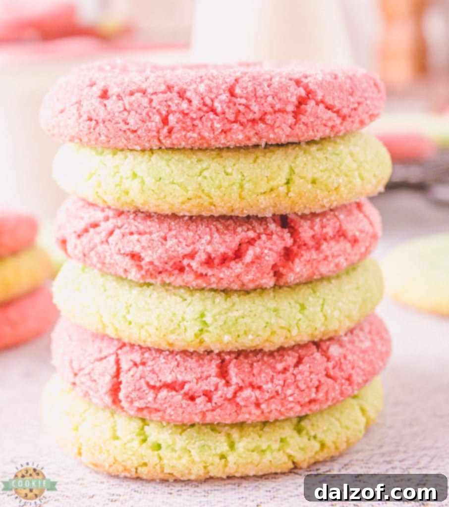 A stack of vibrant Jello sugar cookies, showcasing their beautiful colors and inviting texture.