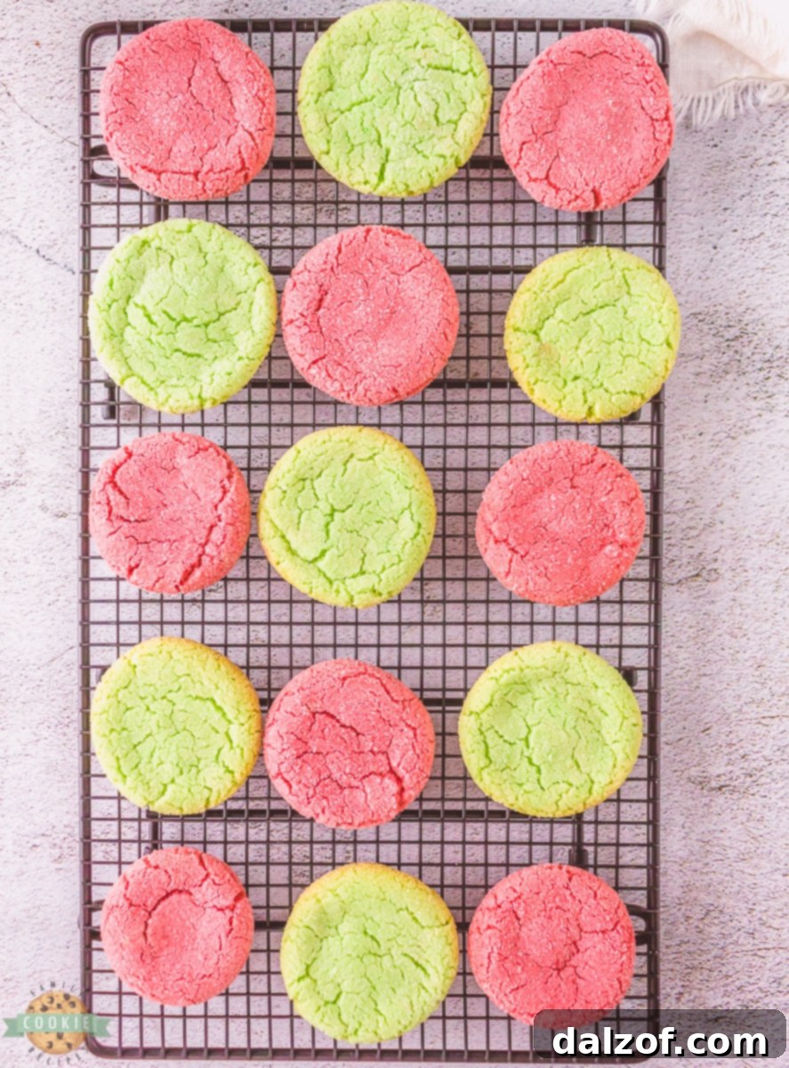 Freshly baked Jello cookies cooling on a wire rack.