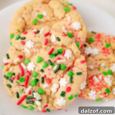 Christmas Sprinkle cookies on a white plate
