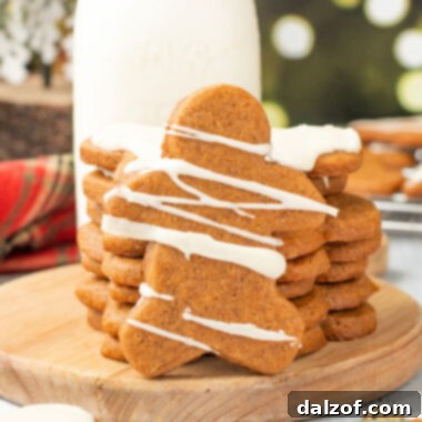 Beautifully decorated Gingerbread Cookies with Maple Icing, a classic holiday treat.