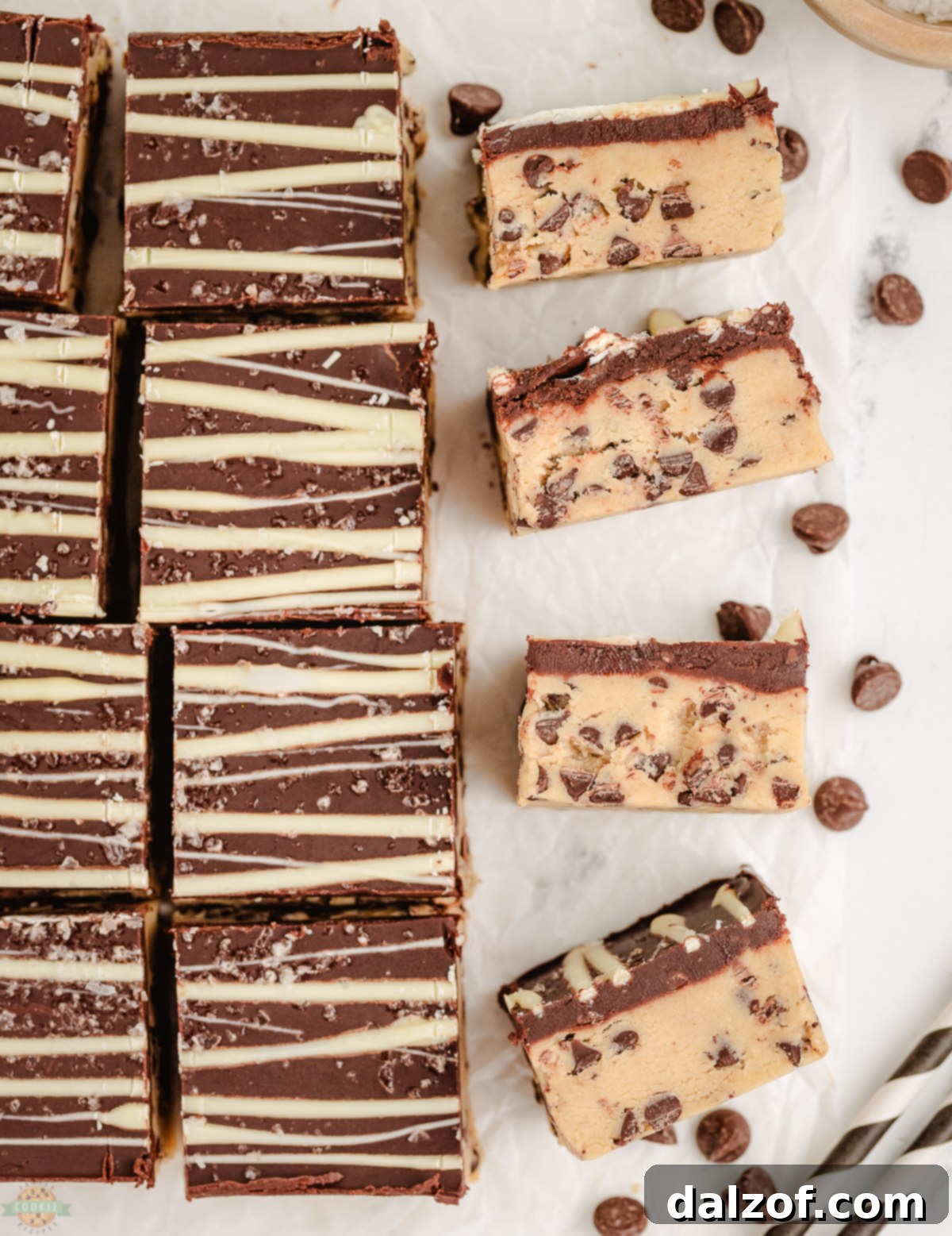 A tray full of perfectly cut no-bake chocolate chip cookie dough bars, ready to be served.