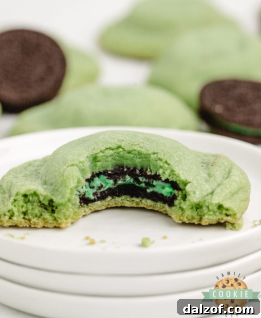 Mint Oreo Stuffed Cookies broken open to reveal the Oreo center.