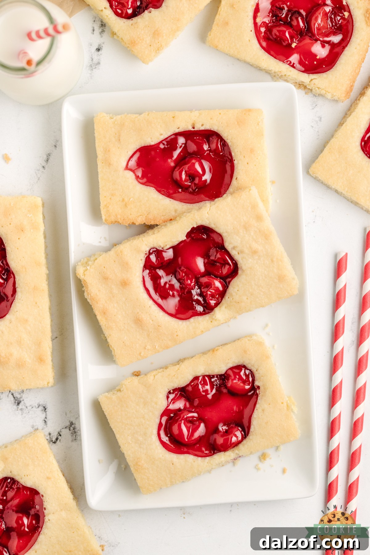 Cherry pie cookie bars arranged on a serving platter for a party or holiday gathering.