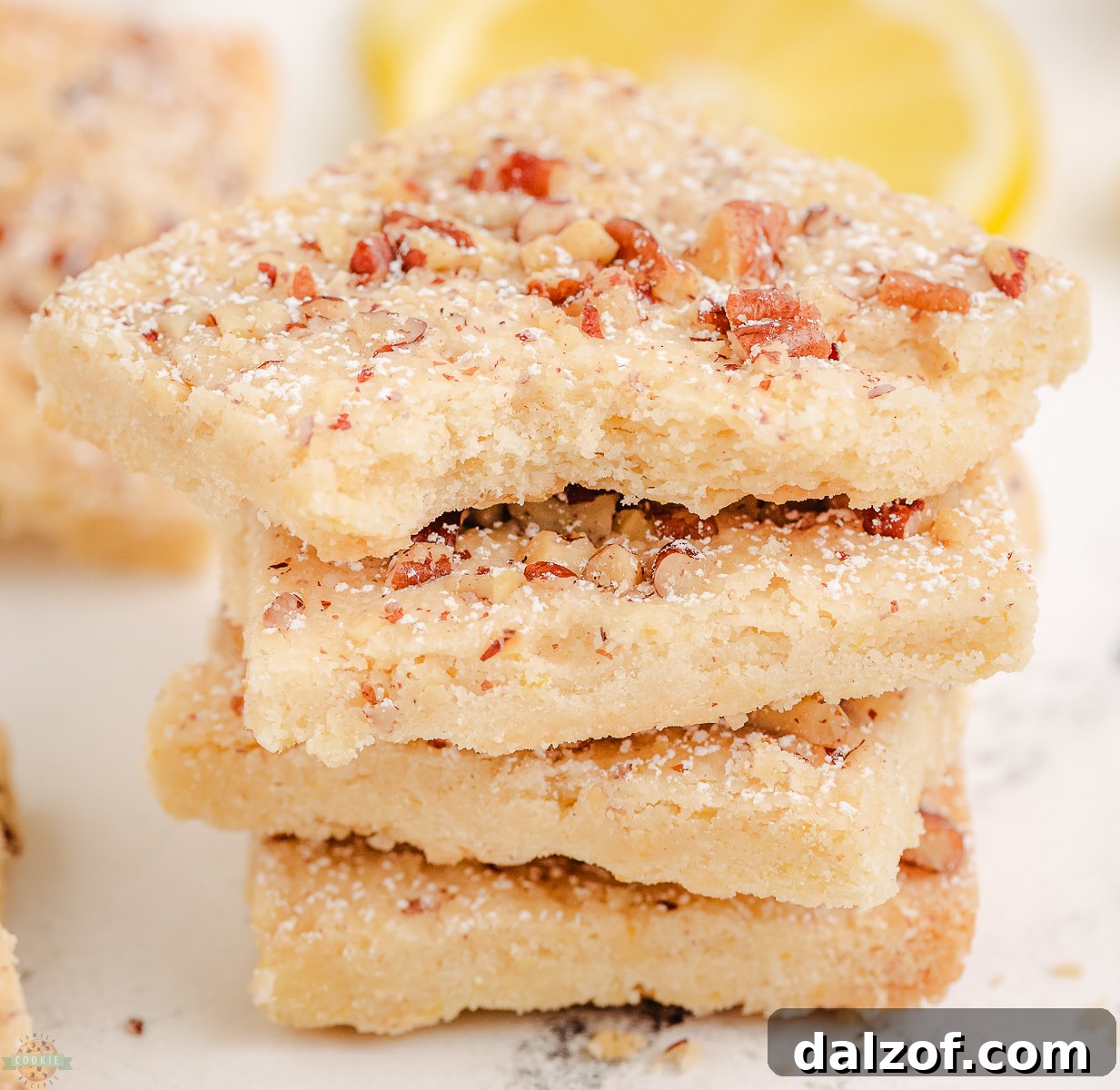 stack of lemon pecan shortbread bars