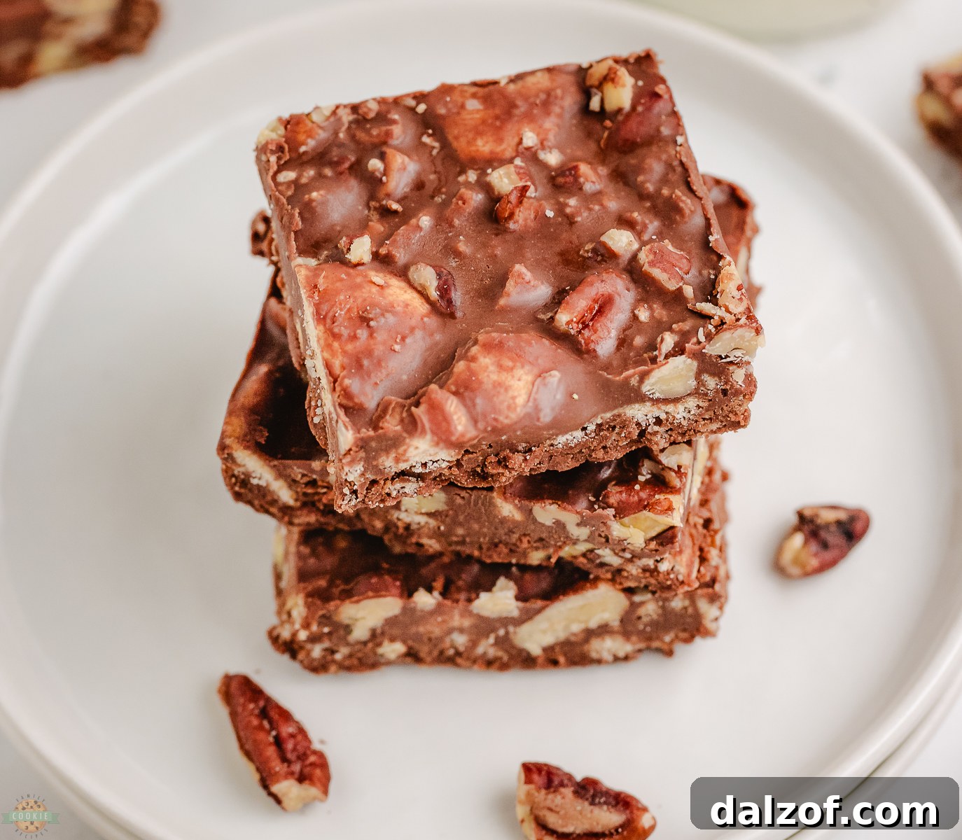 stack of chocolate pecan no bake cookie bars