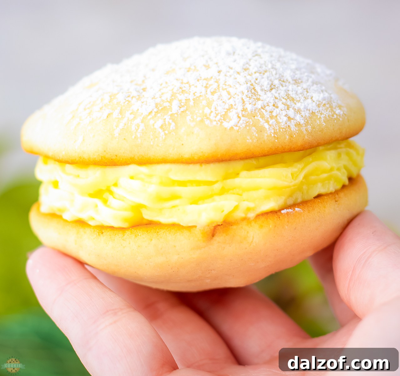 holding a banana cream whoopie pie